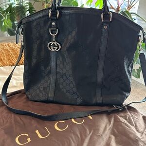 Pre owned Gucci black purse with interlocking G logos